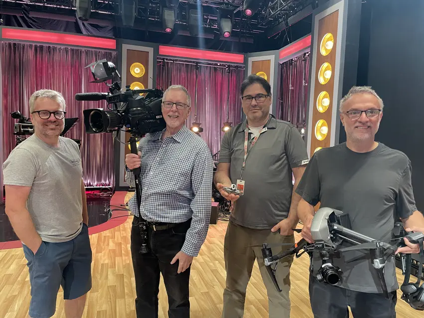 Jacques and Mireille visiting a Radio-Canada television studio and exploring broadcast production equipment with staff / Jacques et Mireille visitant un studio de télévision de Radio-Canada et découvrant l’équipement de production télévisuelle avec le personnel